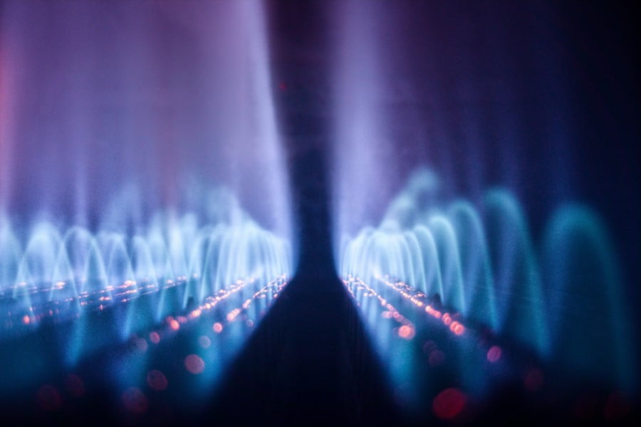 a blue light rays in a dark room