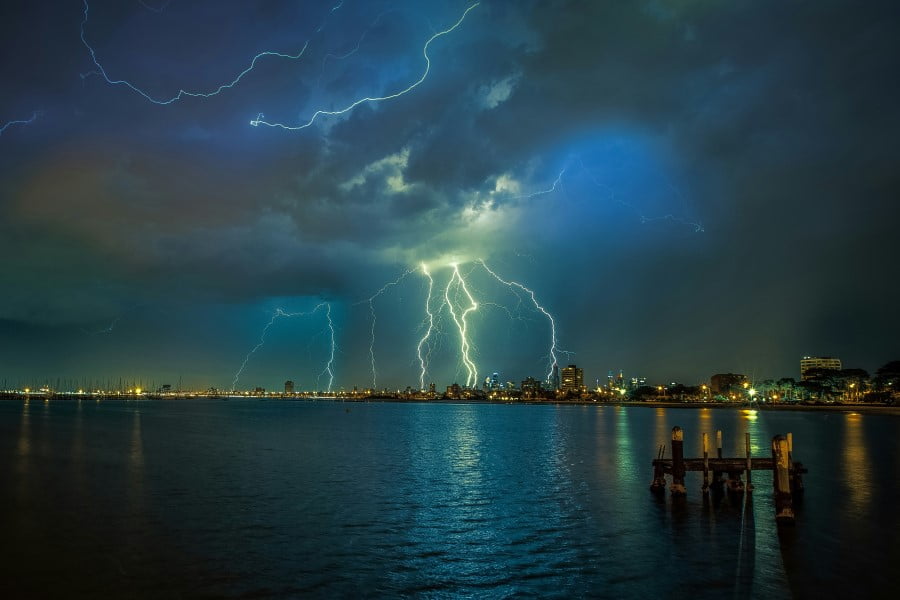 lightning striking lightning over a city
