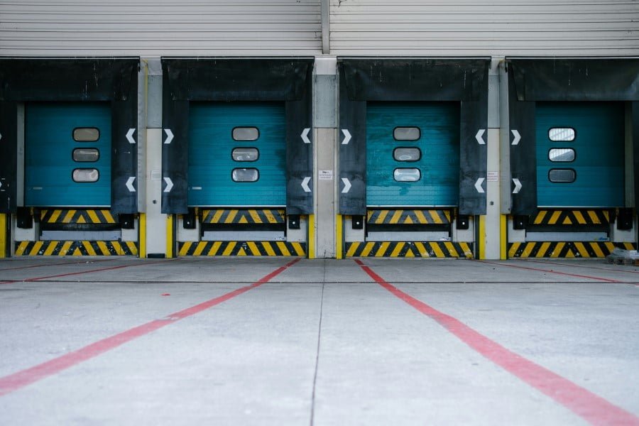 a row of blue doors