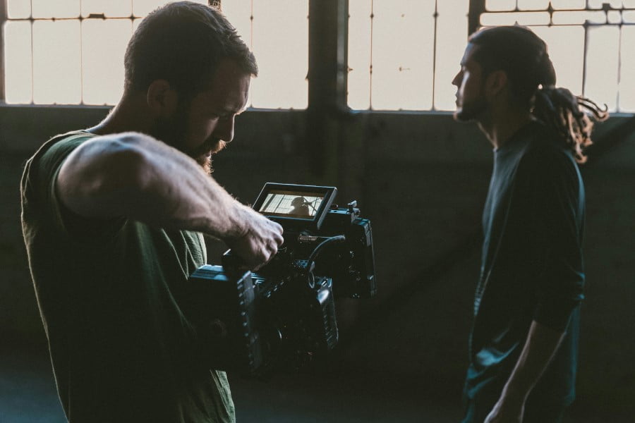 a man holding a camera