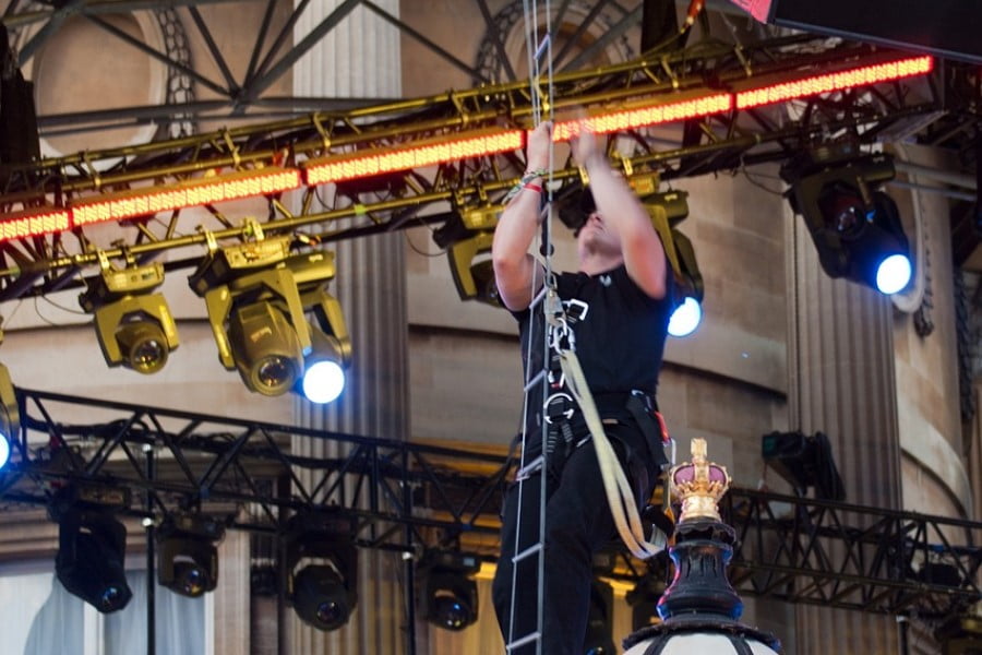 Rigger a man climbing a rope