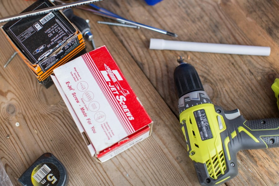 Set Construction a drill and box on a table