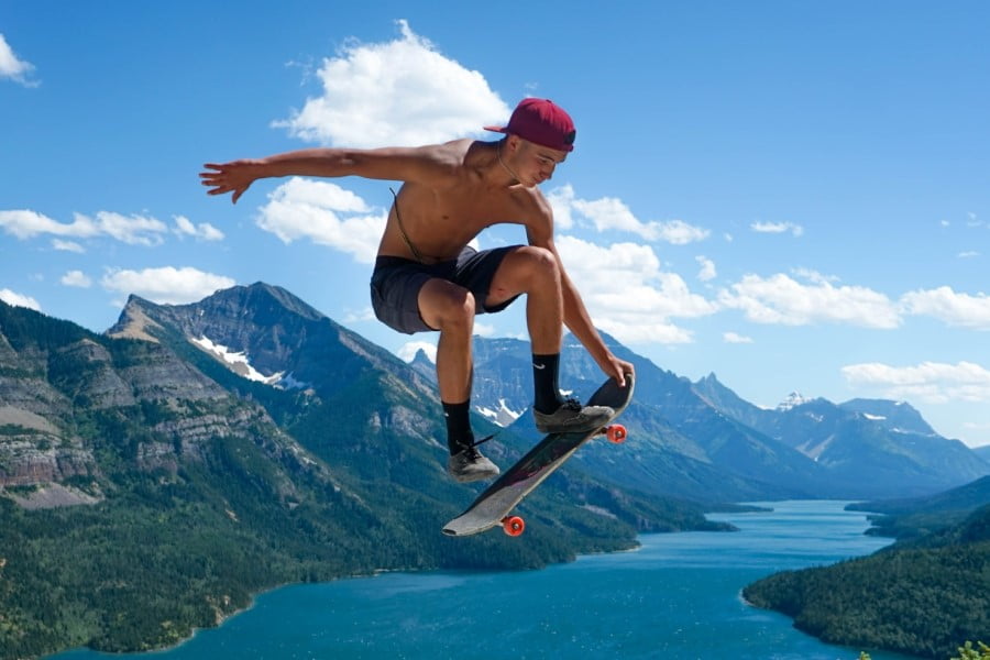 Skate a man jumping in the air with a skateboard