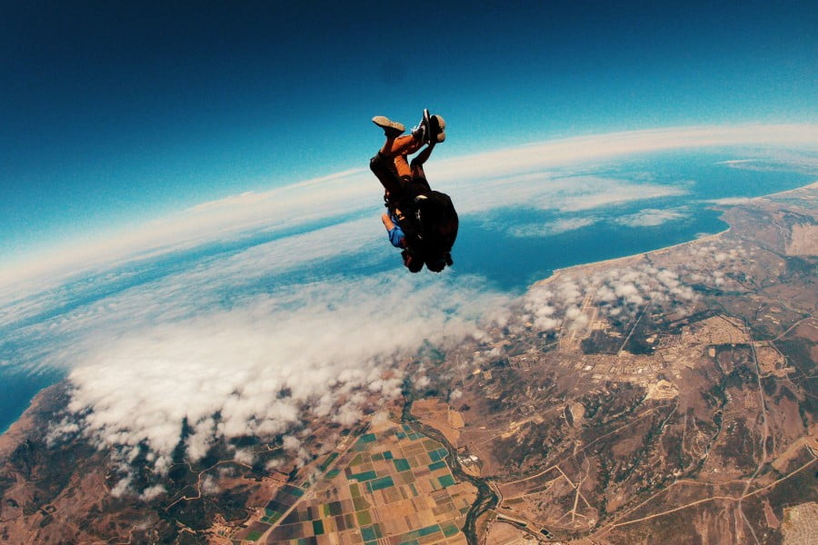 Skydive a person skydiving in the air