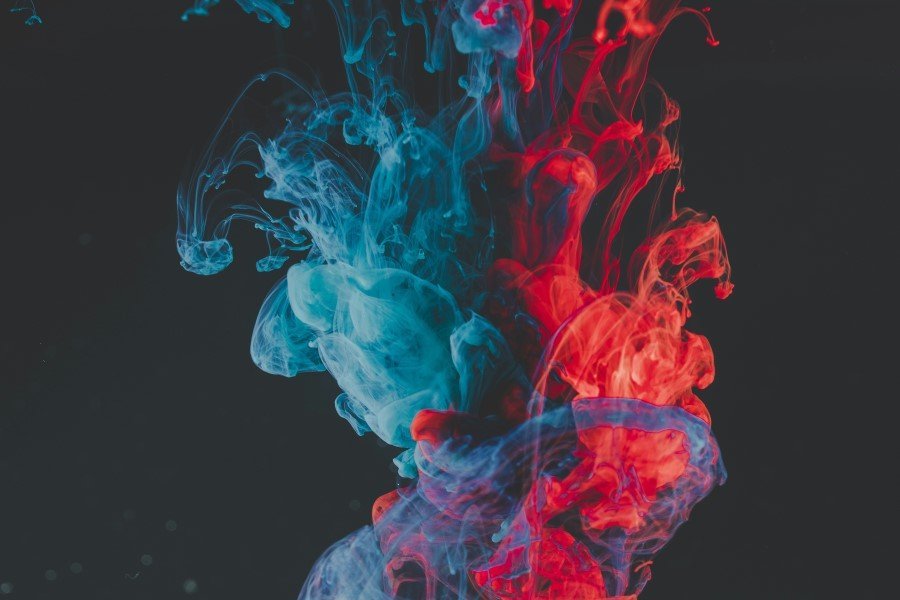 a red and blue smoke