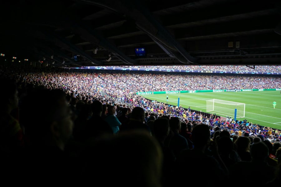 a large crowd of people in a stadium