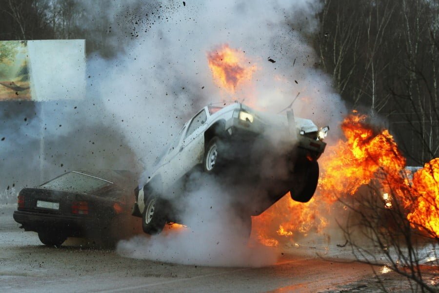 Stunt pic a car on fire and smoke