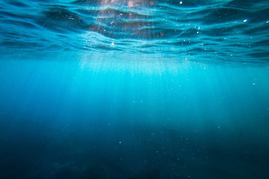 sunlight shining through the water